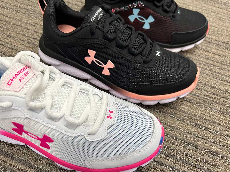 Three Pairs of Under Armour Shoes Side by Side