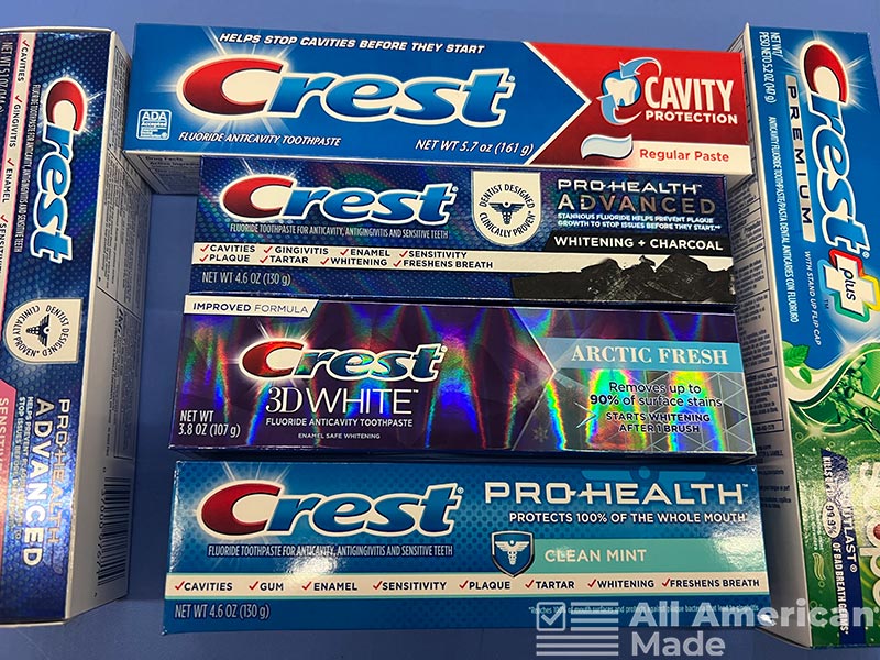 A bunch of Crest Toothpaste