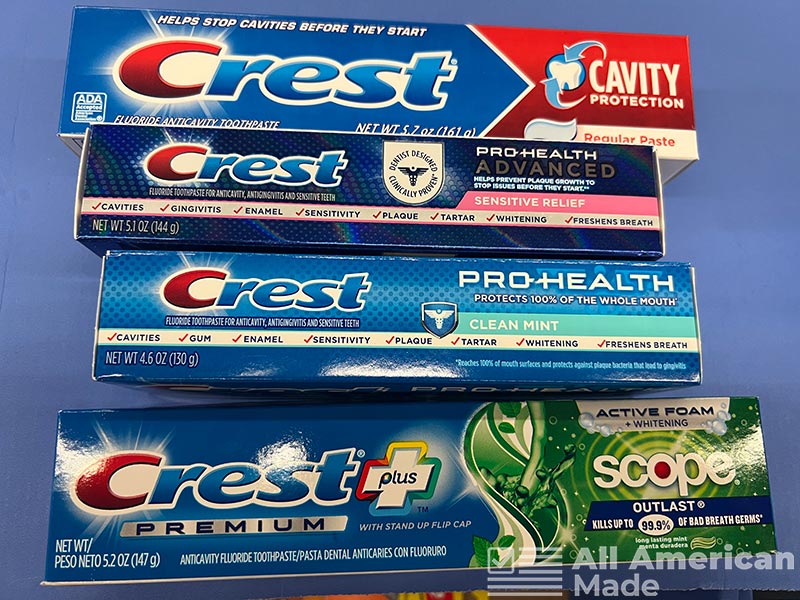 Multiple Boxes of Crest Toothpaste Side by Side